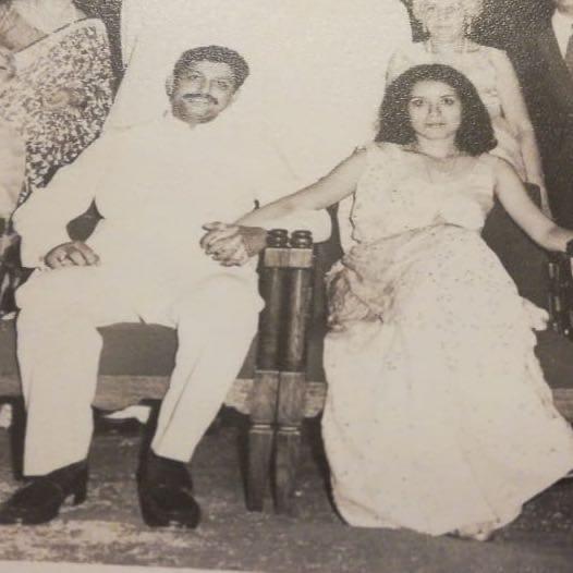 A vintage photograph of Mehelli and Hutokshi holding hands
